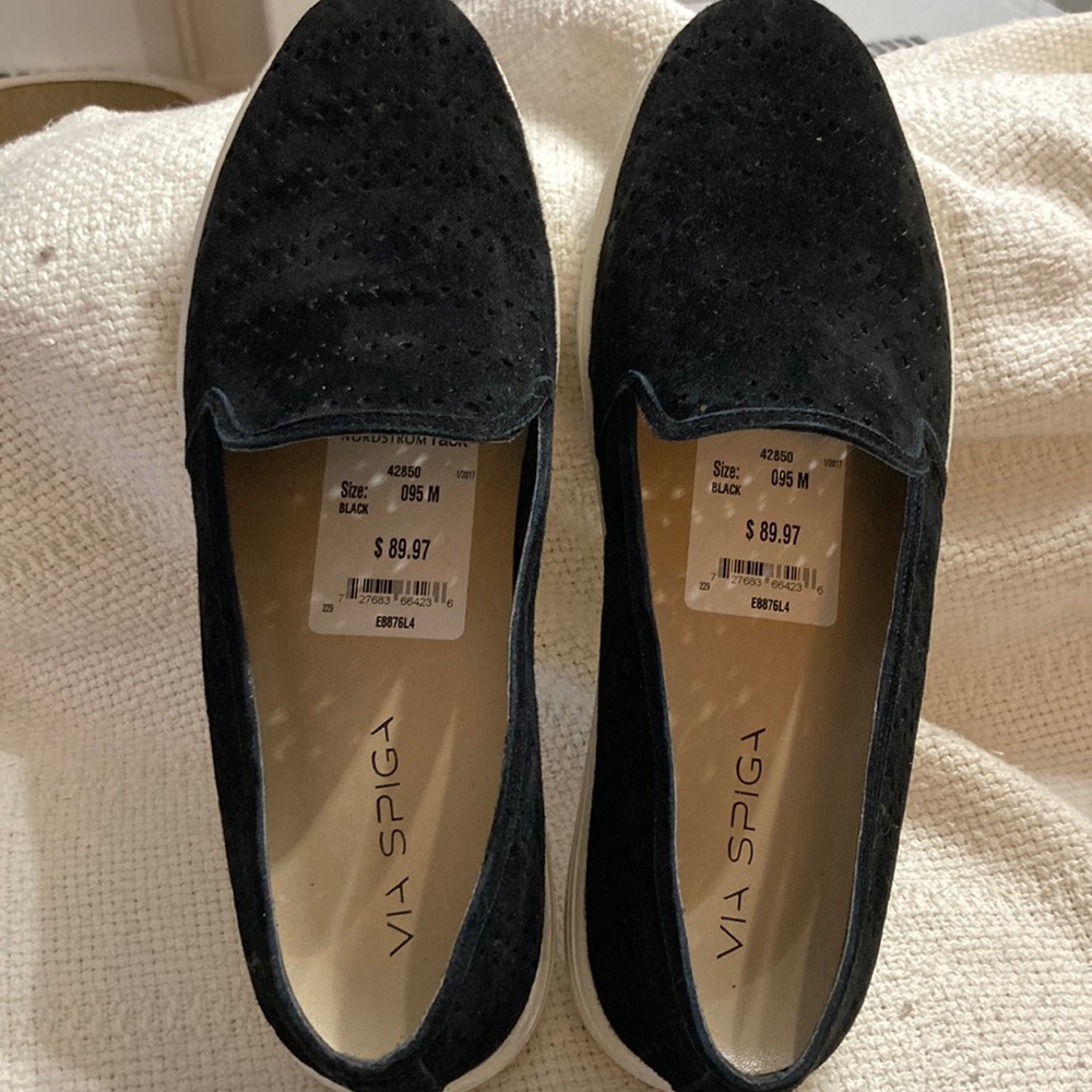 Women’s black suede slip ins